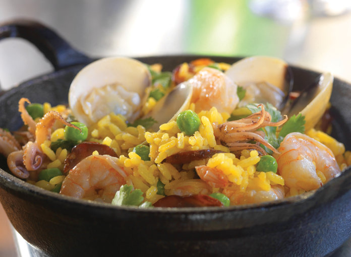 Mixed seafood paella with saffron rice