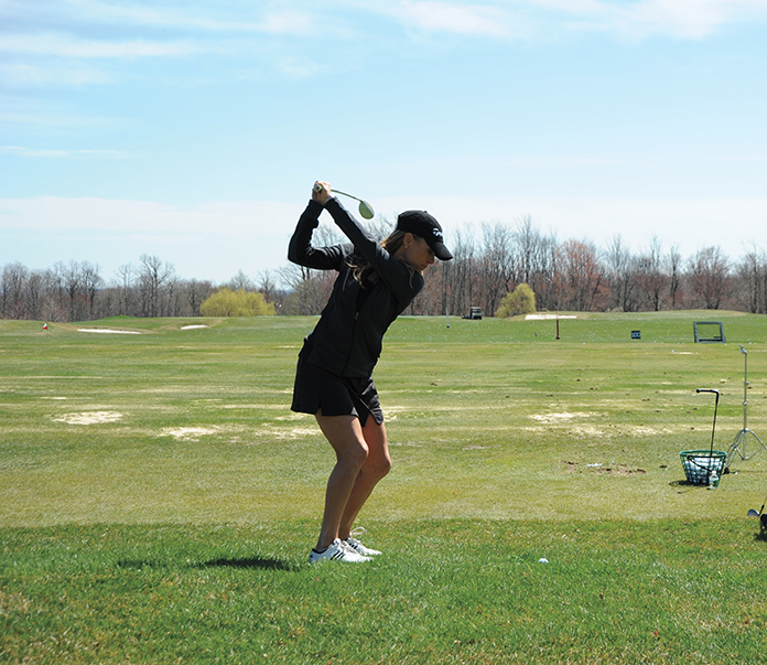 Golf-Debbie-Doniger-Practicing