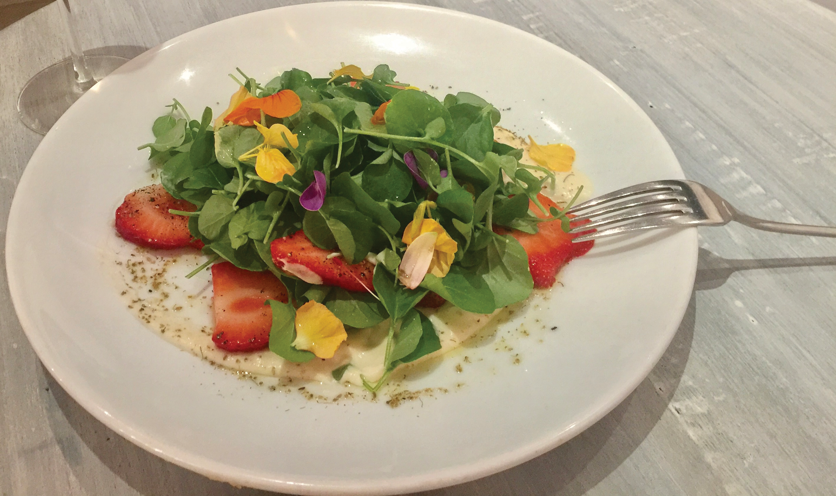 “I am a big fan of the classic spinach and strawberry salad that we serve in late spring through summer at The Cottage,” says Lewis. 