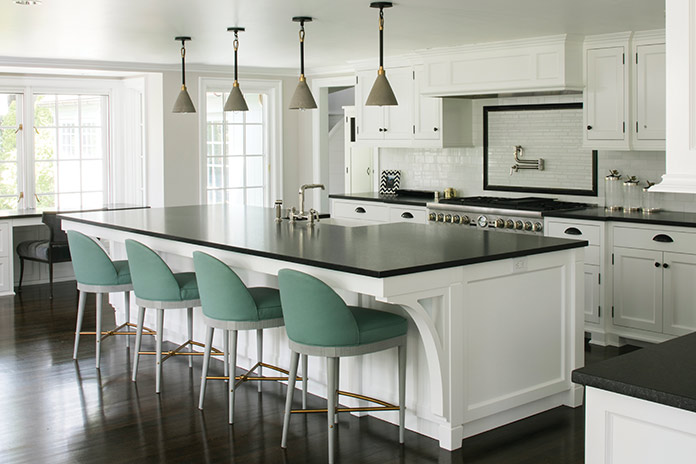 Black and white are both traditional and contemporary in this transitional-style kitchen.