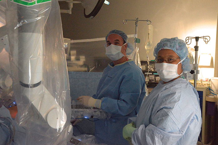 Surgeons practicing robotics at Greenwich Hospital
