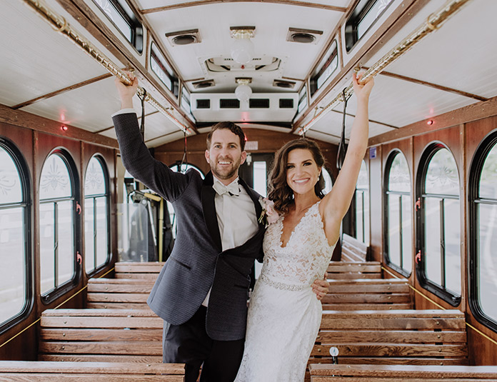 Bride and groom in a trolly