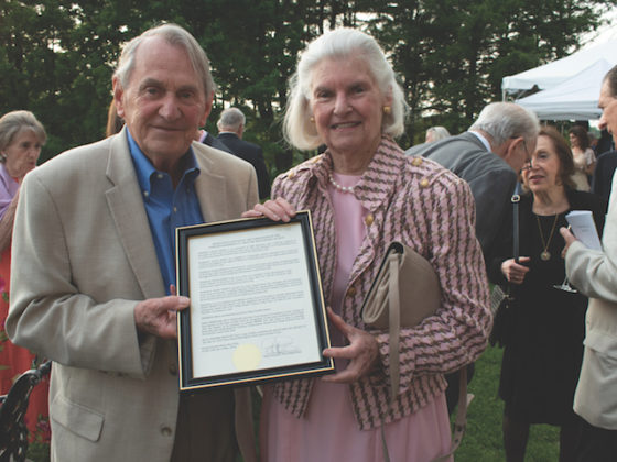 Image of Honoree Susan Henry receives a proclamation from Lewisboro Town Supervisor Peter Parsons