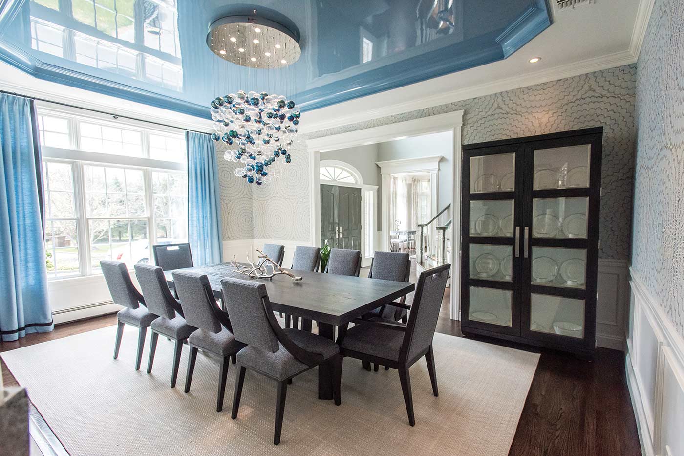 Dining room with blue ceiling