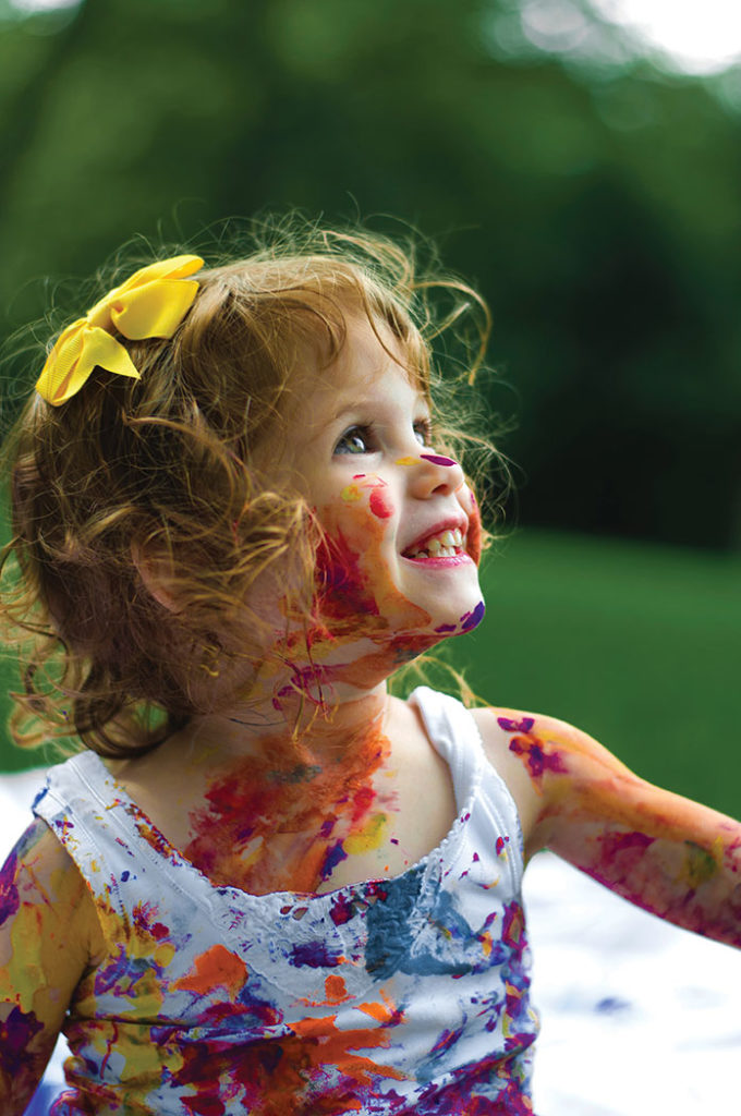 Girl with paint all over