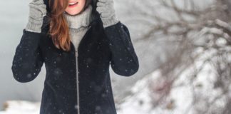 Winter scene with girl in snow