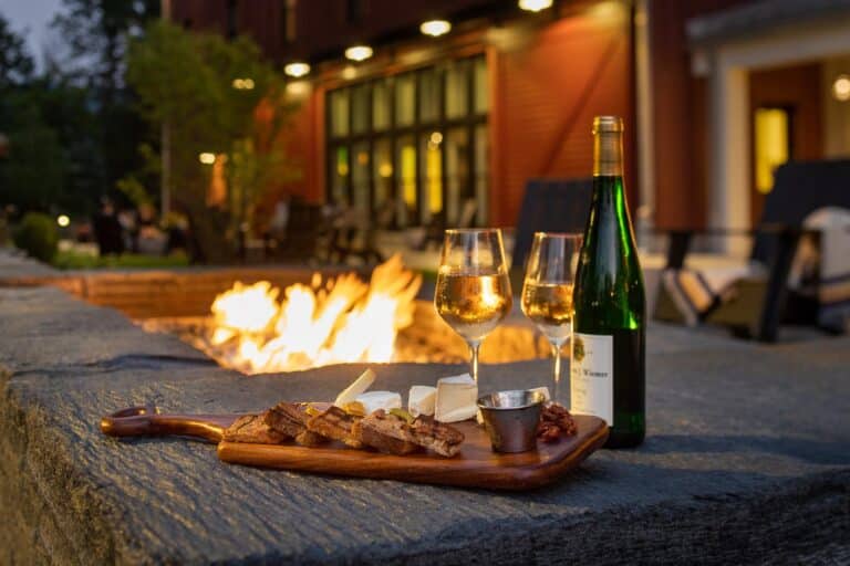 Drinks and cheese by outdoor fire pit at Williams Inn