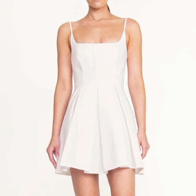 Staud mini white dress with thin straps on woman