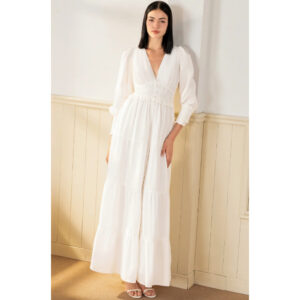 White long sleeve maxi dress on a woman